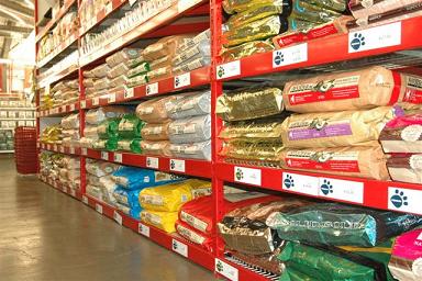 Photo of racks of bags of dog food